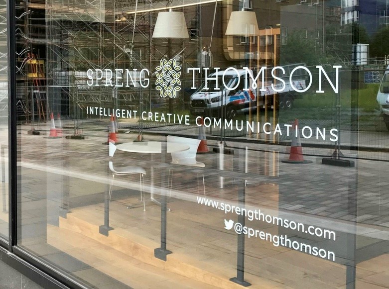 Spreng Thomson logo